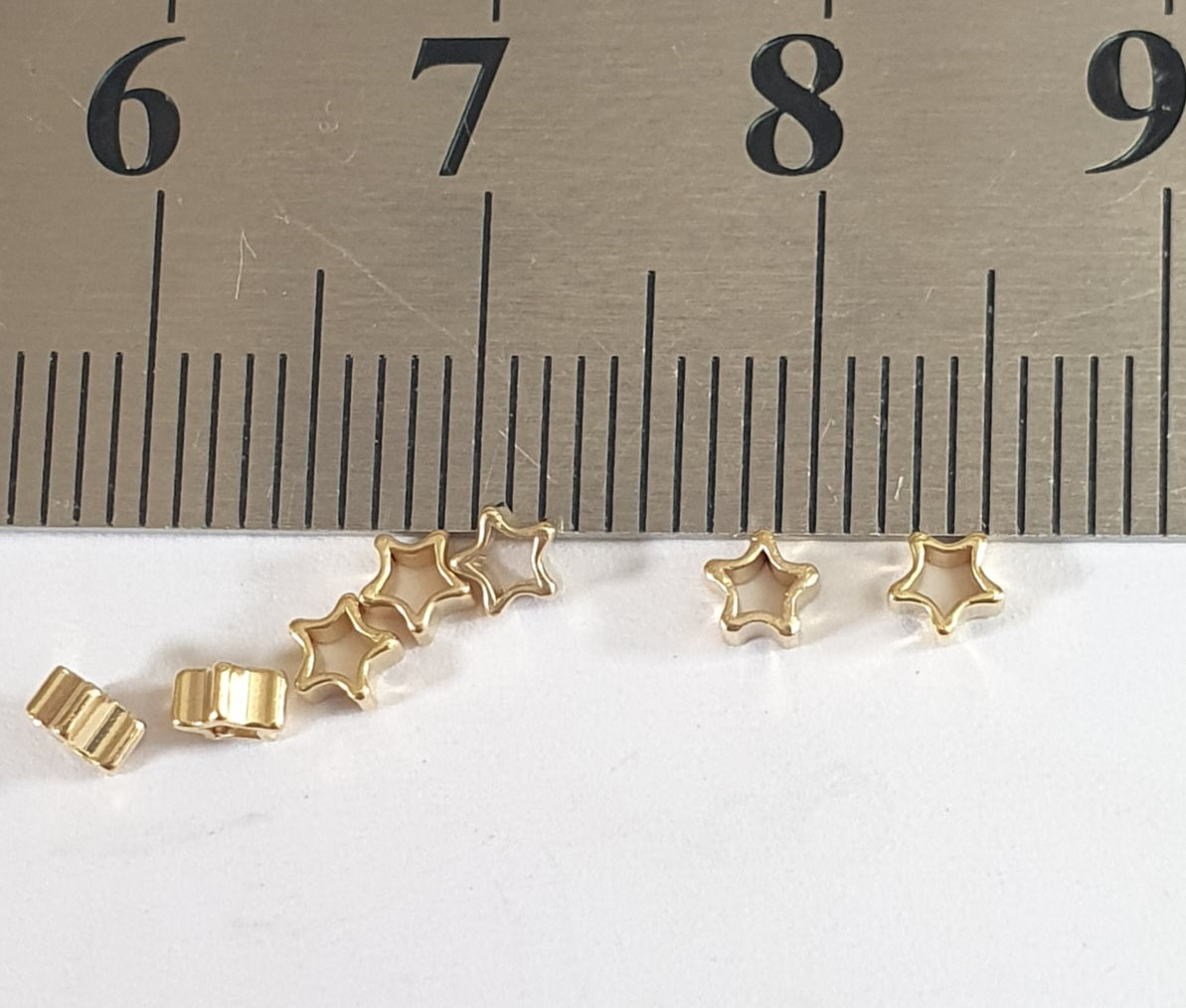 Mostacilla estrellita insumo de baño de Oro