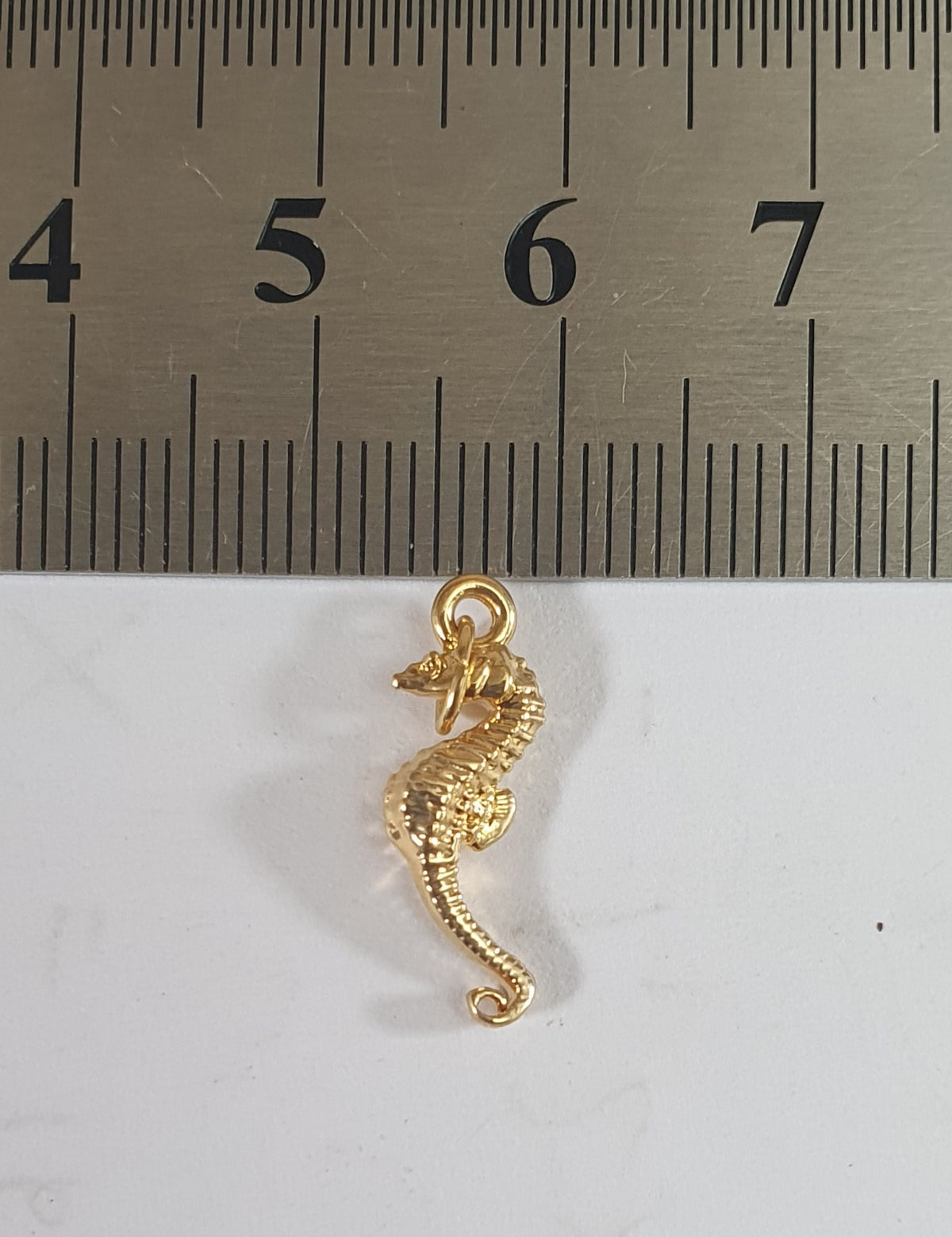 Dije Caballito de mar Insumo baño de Oro