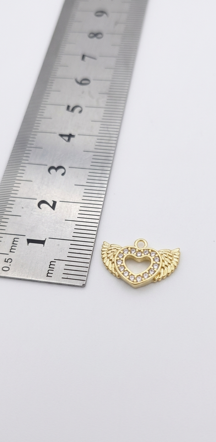 Dije corazón alado circonado