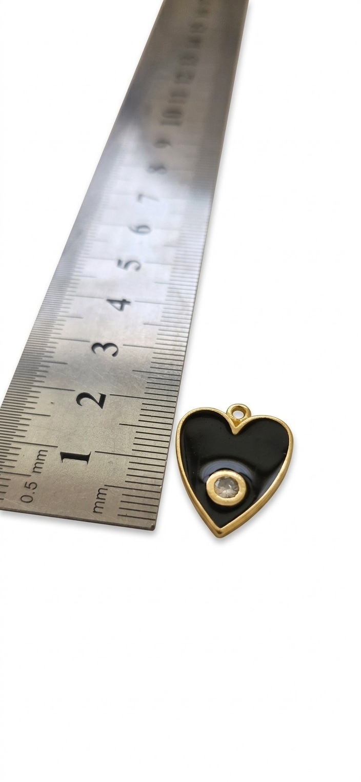 Dije corazón esmaltado negro y circón